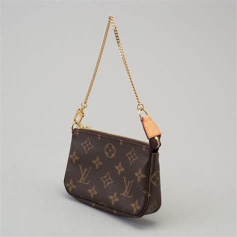 louis vuitton paris mini pouch|Louis Vuitton small shoulder bag.